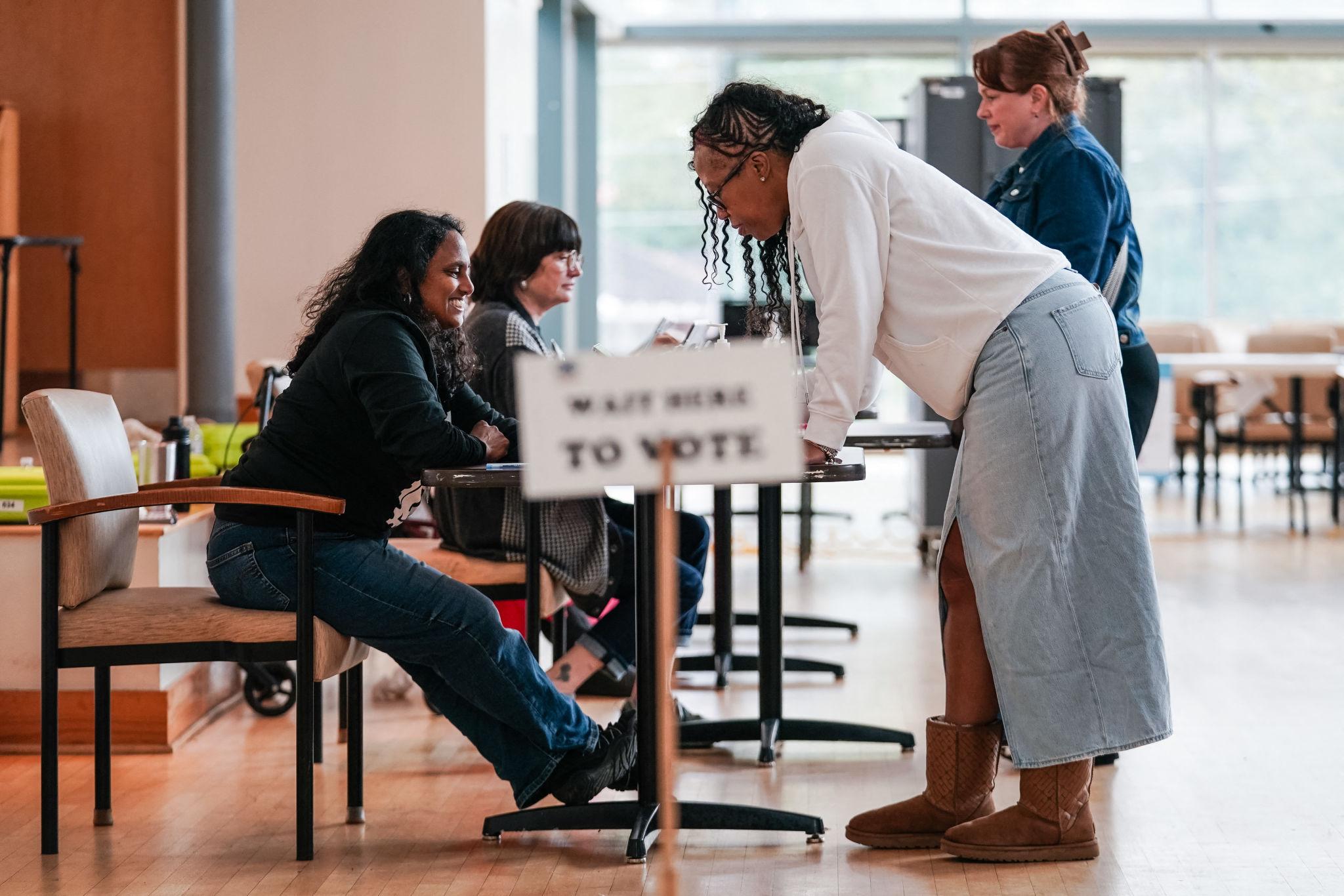 Election workers processing ballots during a modern election